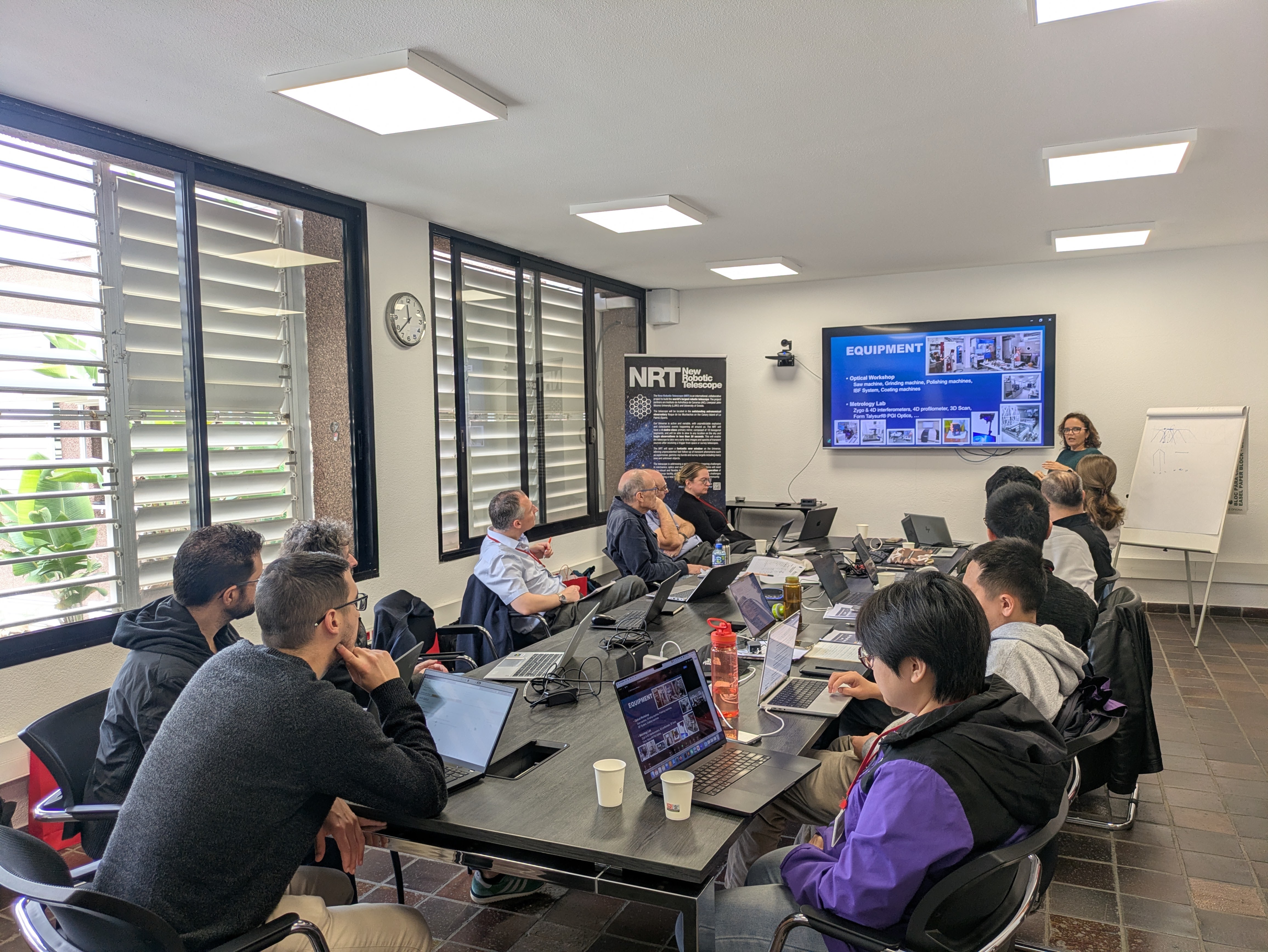 Photo taken of the participants listening to a presentation during the meeting